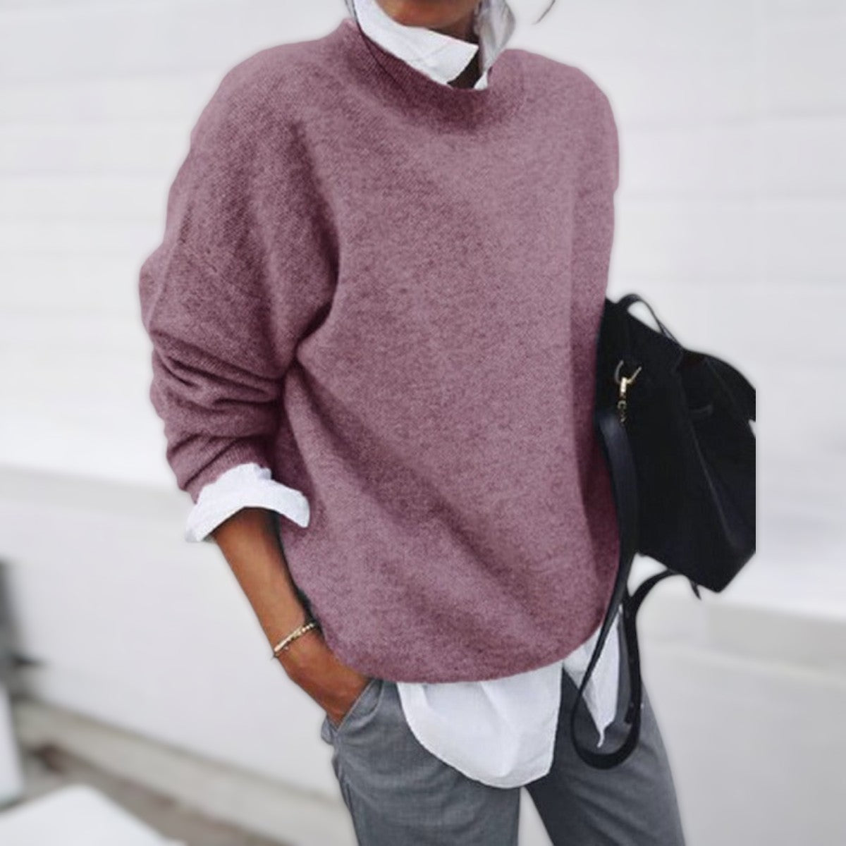 Beige relaxed crewneck knit sweater with soft texture, versatile everyday layering essential