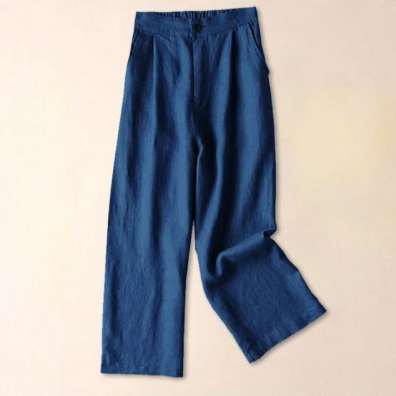 Neutral Tencel linen relaxed-fit tailored pants with fluid drape and button closure for professionals