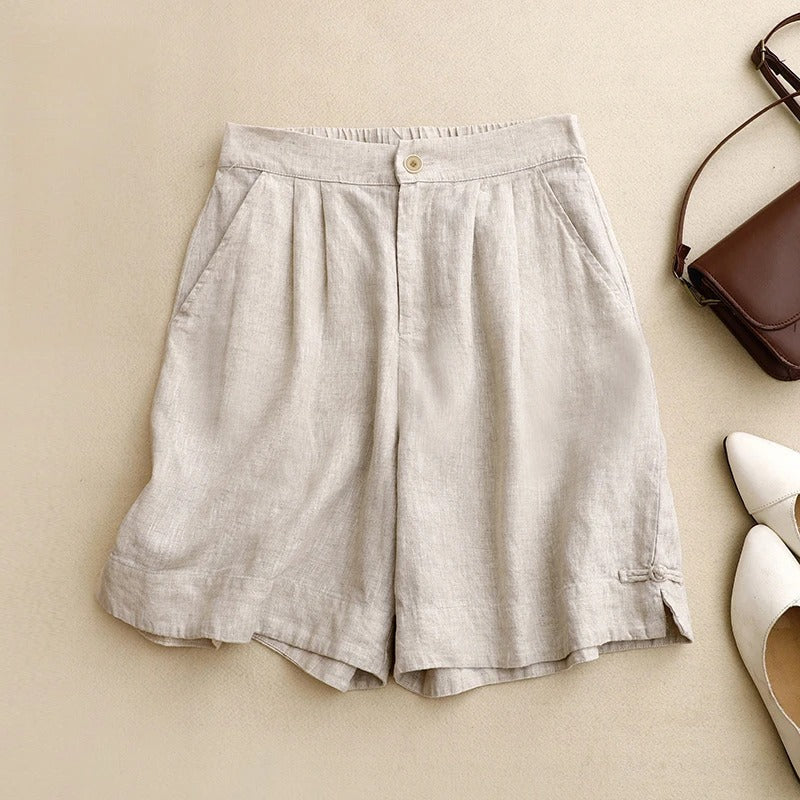 Women's relaxed linen shorts with soft waistband, subtle pleats, and side pockets for effortless summer style