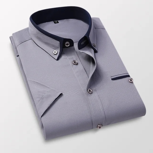 Men's short sleeve dress shirt with spread collar and button placket, lightweight breathable fabric
