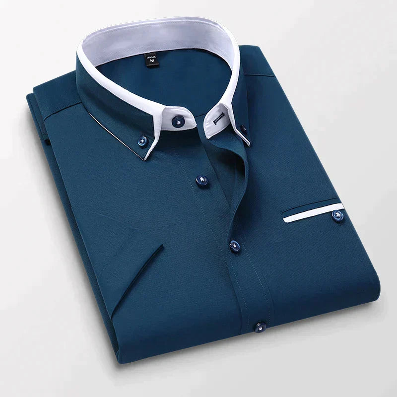 Men's short sleeve dress shirt with spread collar and button placket in breathable lightweight fabric