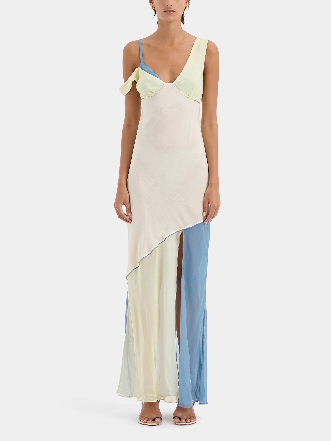 Pastel colorblock maxi dress with asymmetrical silhouette, draped bust overlay, and front split
