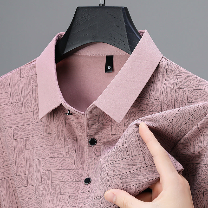 Navy blue executive polo shirt with sharp geometric pattern, slim-fit premium breathable fabric blend