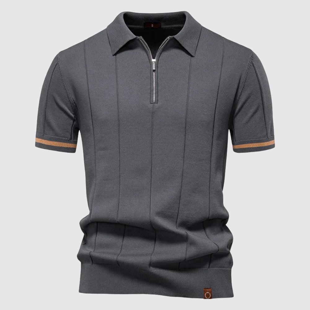 Navy blue athletic-fit polo shirt with breathable zip collar, modern streamlined silhouette