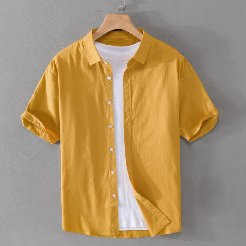 Women's relaxed-fit cotton blend shirt with turn-down collar and button closure, short sleeves