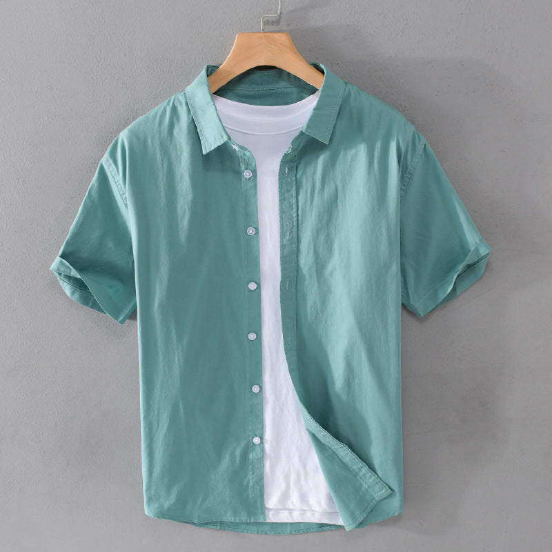 Women's relaxed-fit cotton blend shirt with turn-down collar and button closure for casual elegance