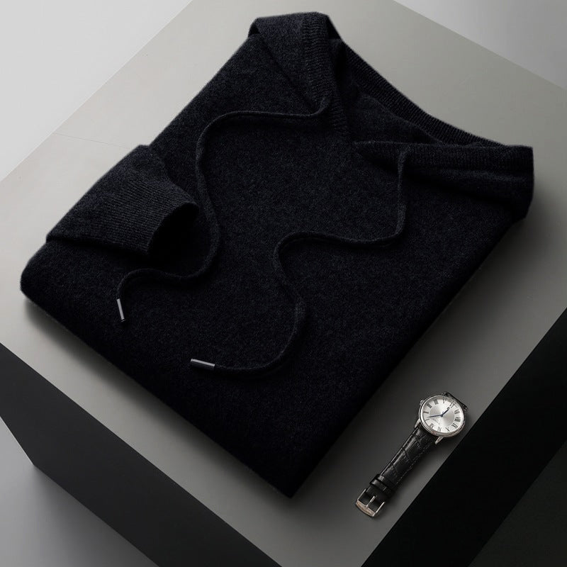Soft gray merino wool hoodie with relaxed fit and premium 100% merino construction for all-day warmth