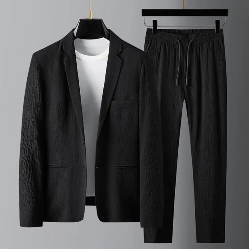 Men's relaxed fit blazer and drawstring pants suit set in neutral tone with lapel collar