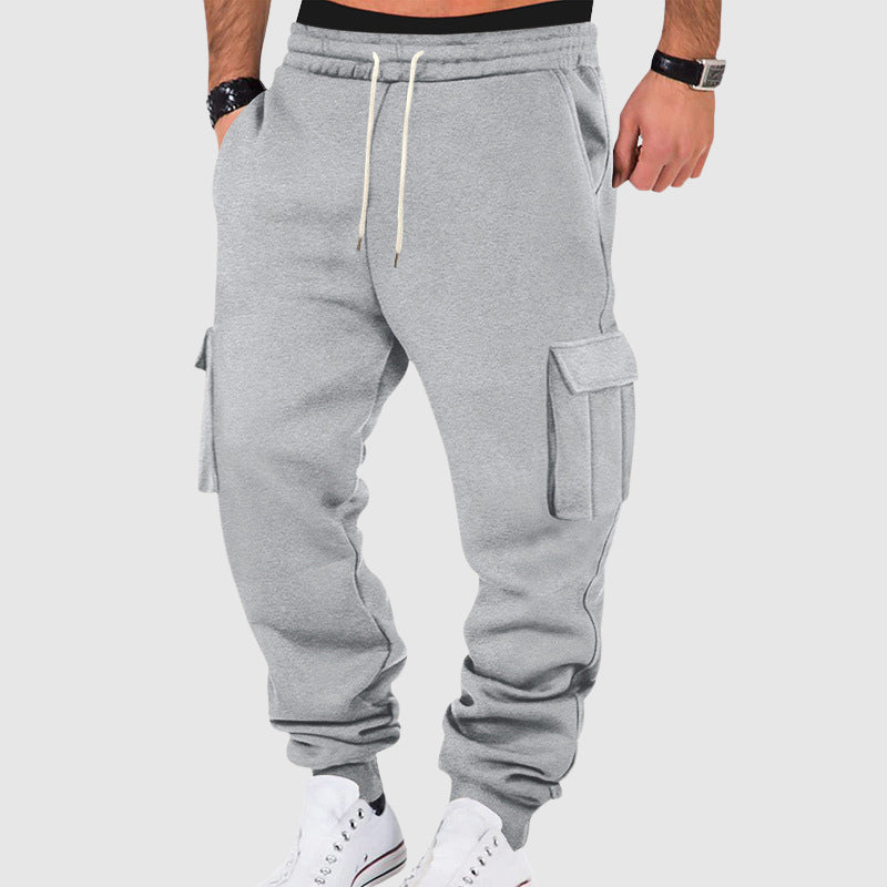 Gray utility fleece pants loose tapered fit deep pockets cold weather comfort streetwear style