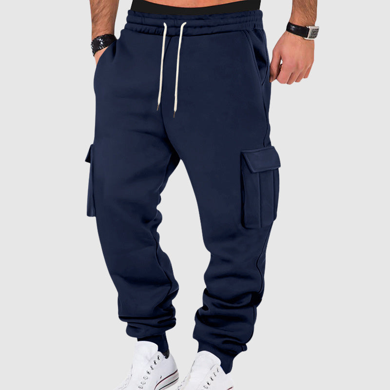 Gray loose-fit tapered fleece utility pants with deep pockets for cold weather comfort