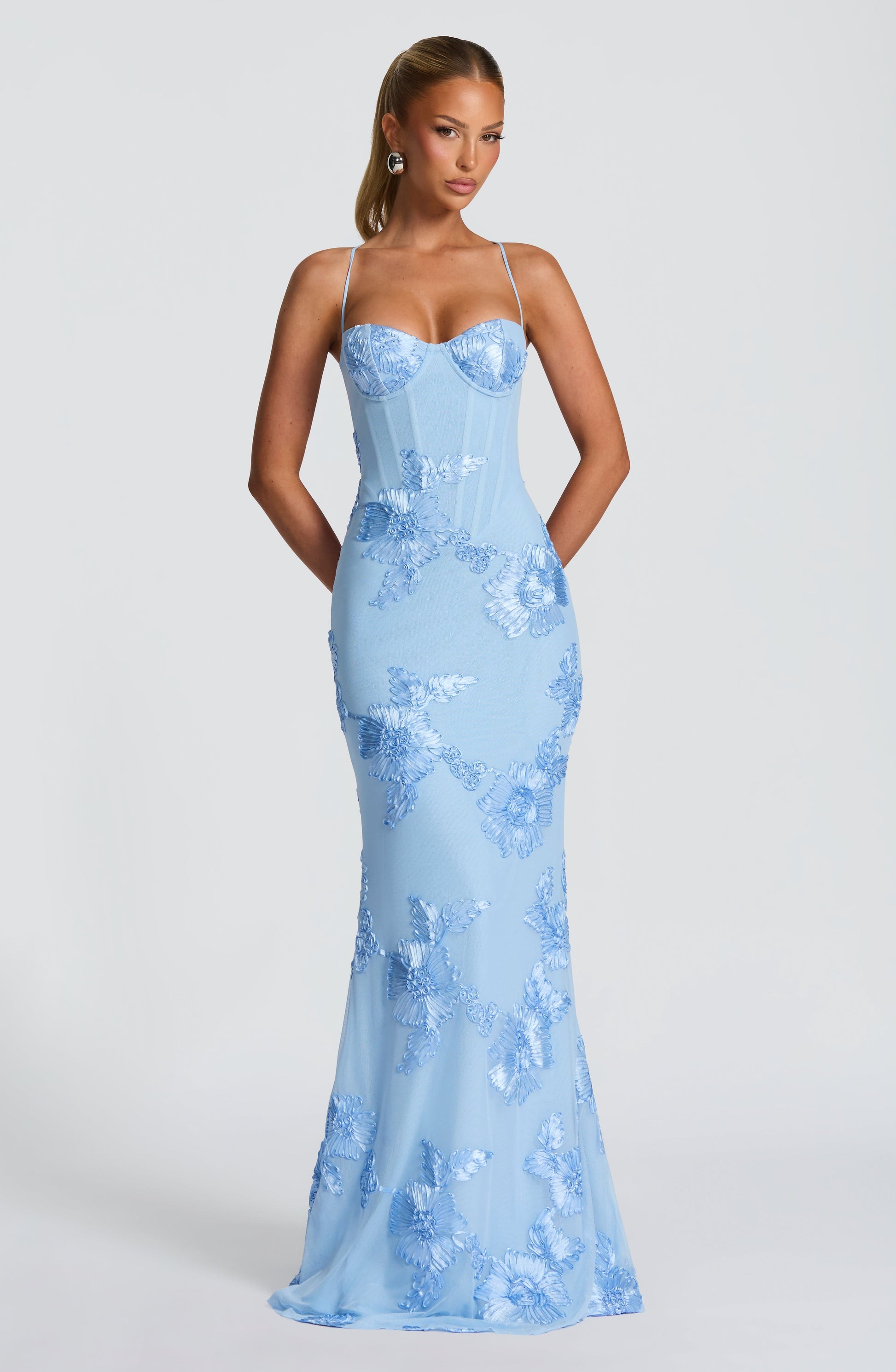 Ivory floral jacquard corset maxi dress with ethereal detailing and floor-length silhouette