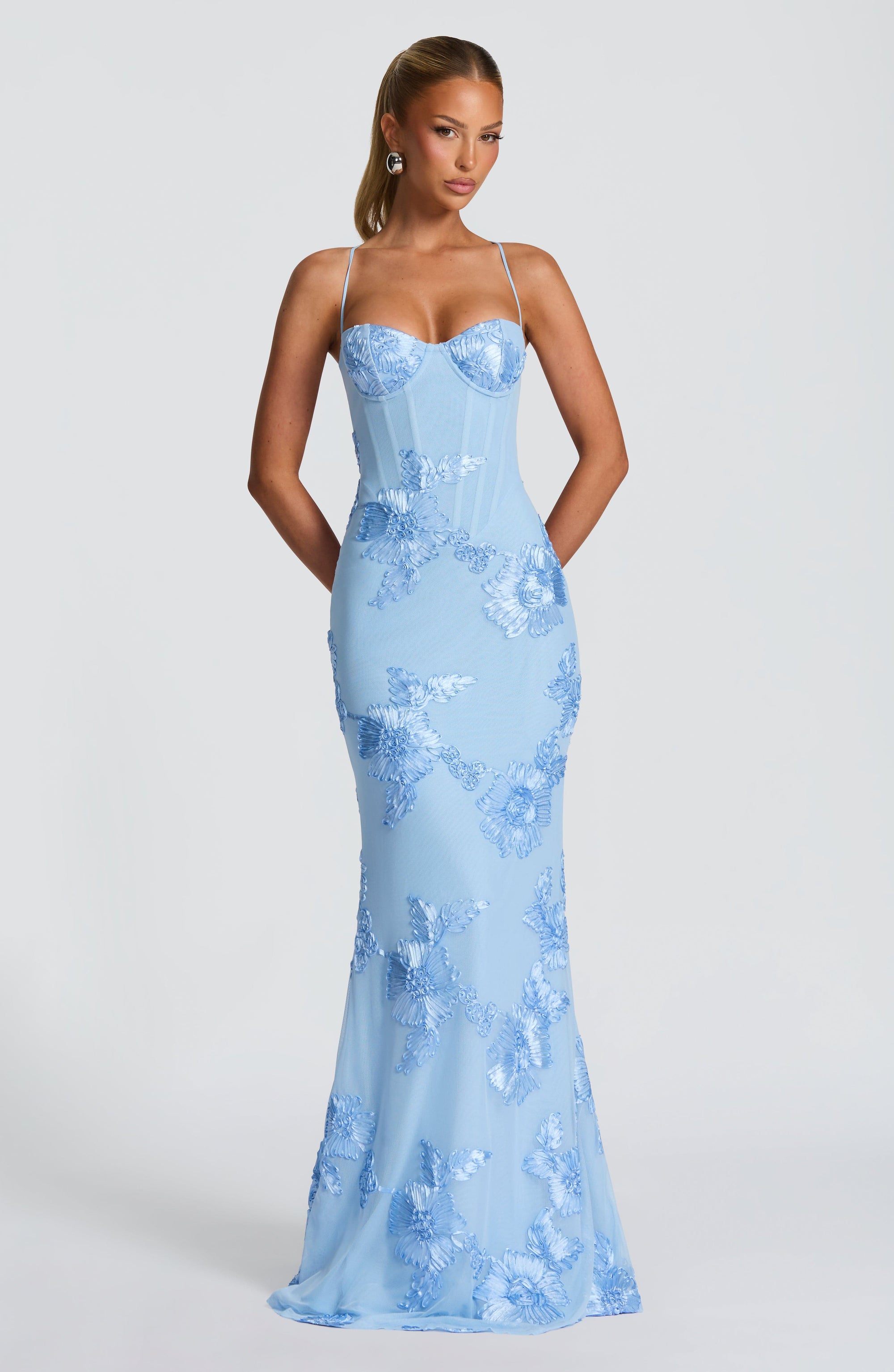 Ivory floral jacquard corset maxi dress with ethereal detailing and floor-length silhouette