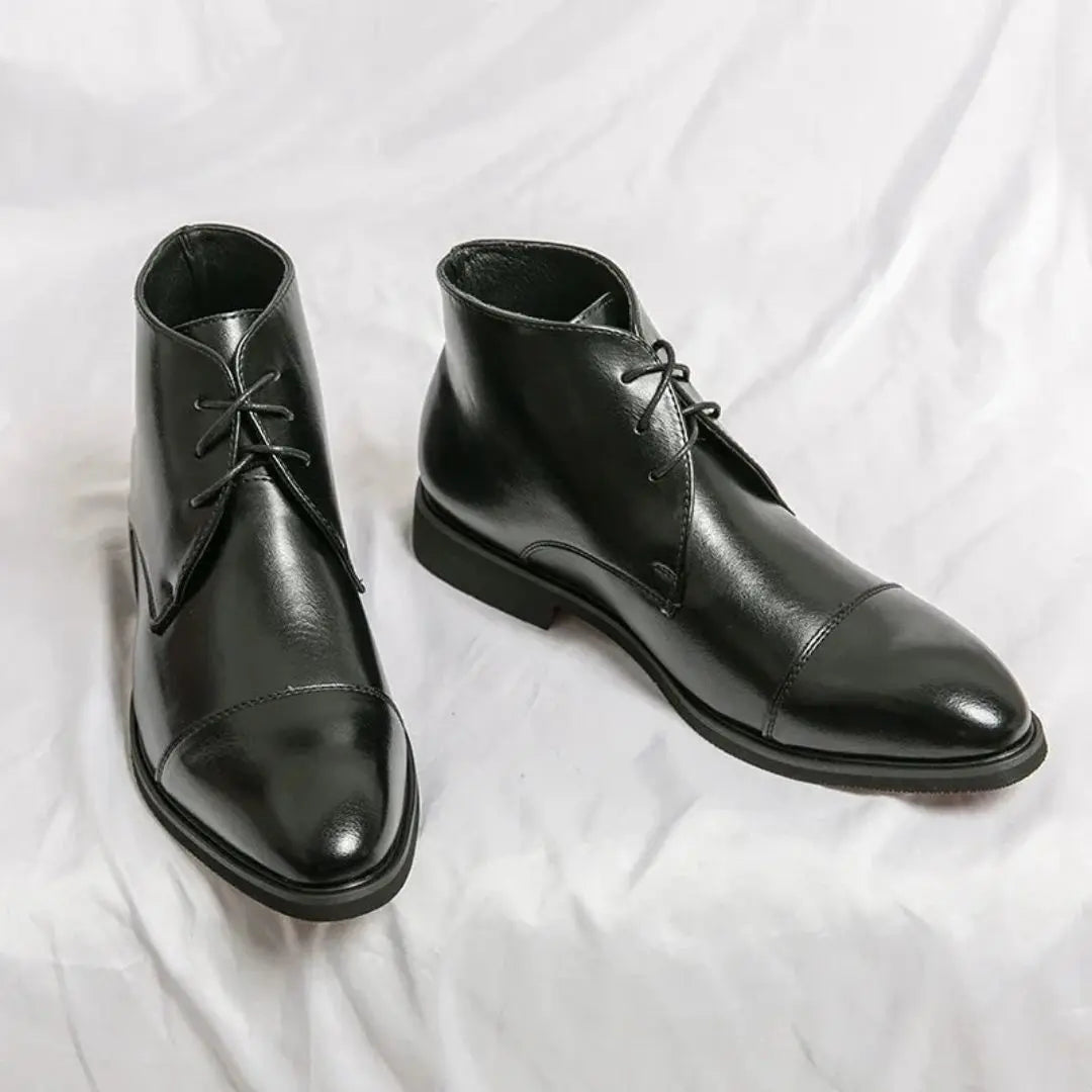 Men's brown handcrafted leather dress boots, sleek formal silhouette with luxury stitching detail