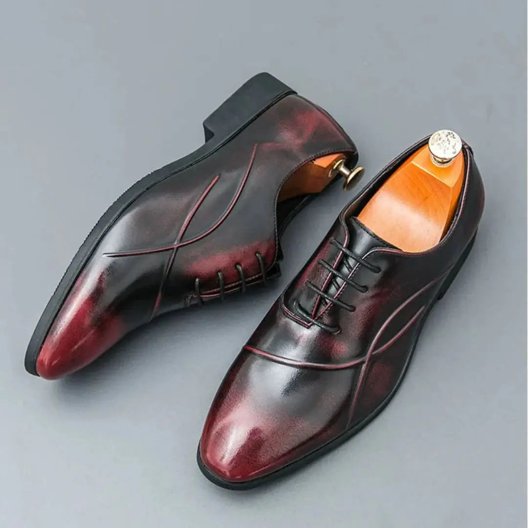 Men's two-tone oxford dress shoes with sleek pointed toe and soft lining for formal wear