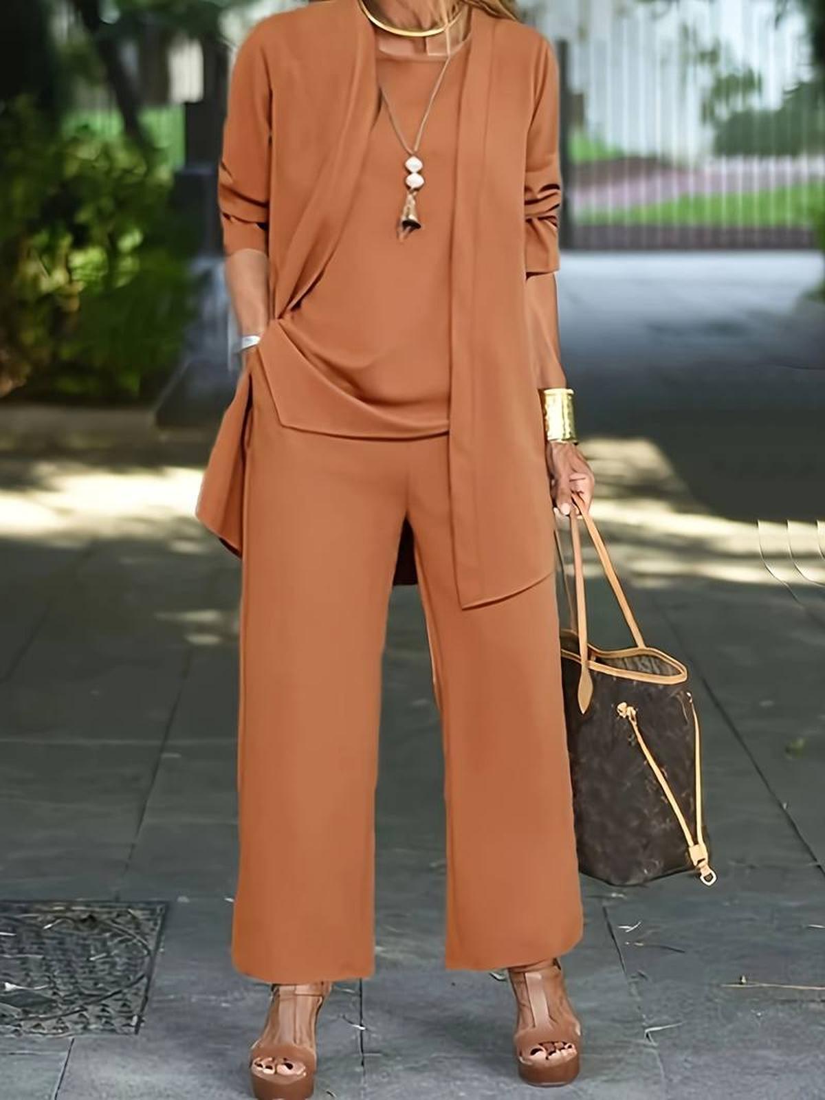 Women's three-piece relaxed outfit set in flowing wide-leg style with lightweight coordinated layers