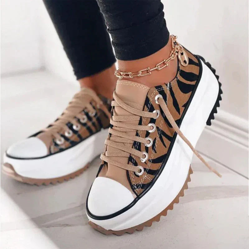 Women's white lace-up platform sneakers with chunky lug sole, low-cut silhouette for everyday style