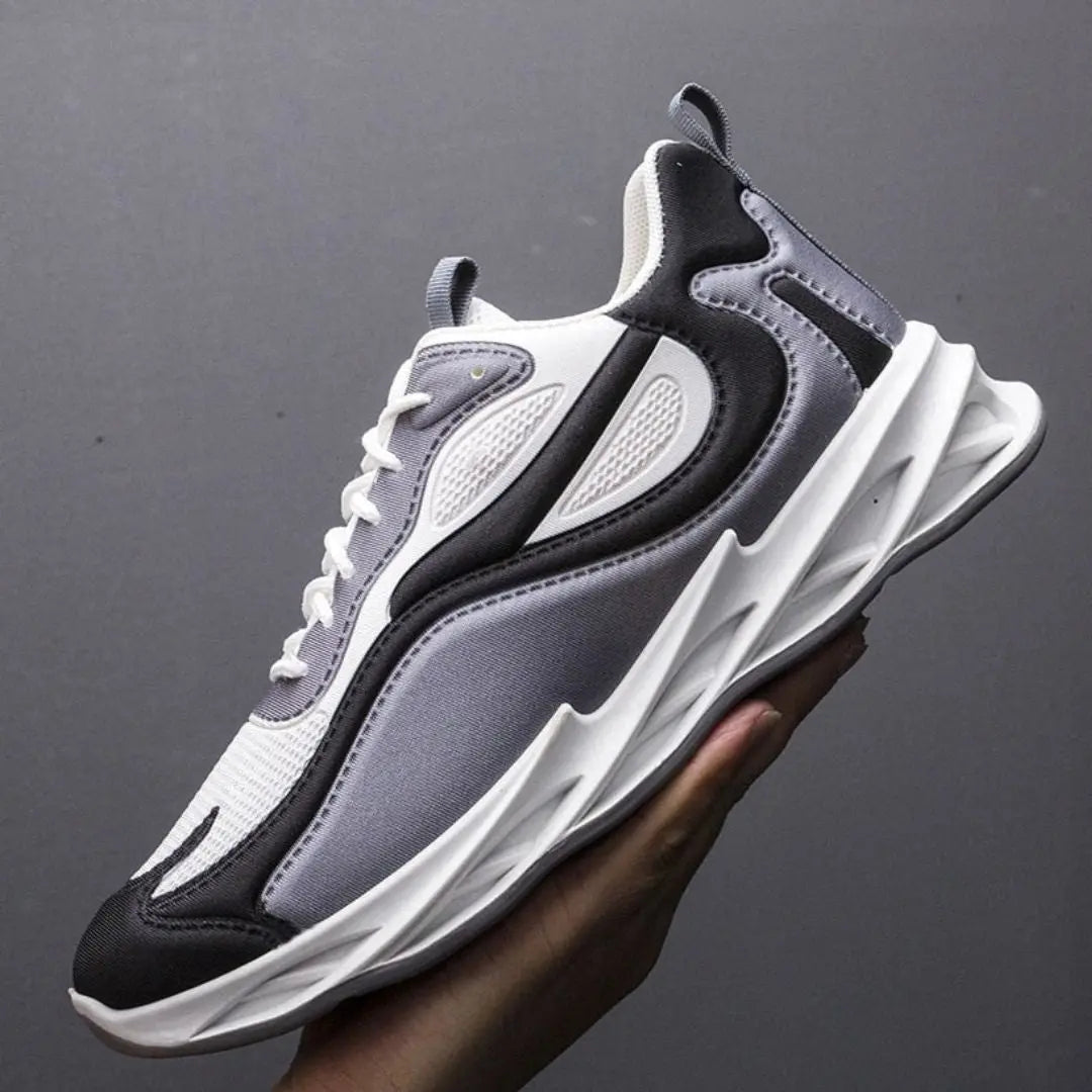 Men's lightweight mesh performance sneakers in bold colorway with sculpted sole and reinforced heel toe