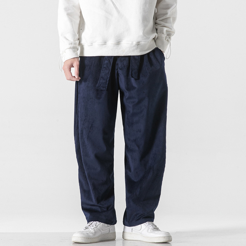 Men's beige corduroy relaxed-fit trousers with adjustable waist ties for everyday comfort