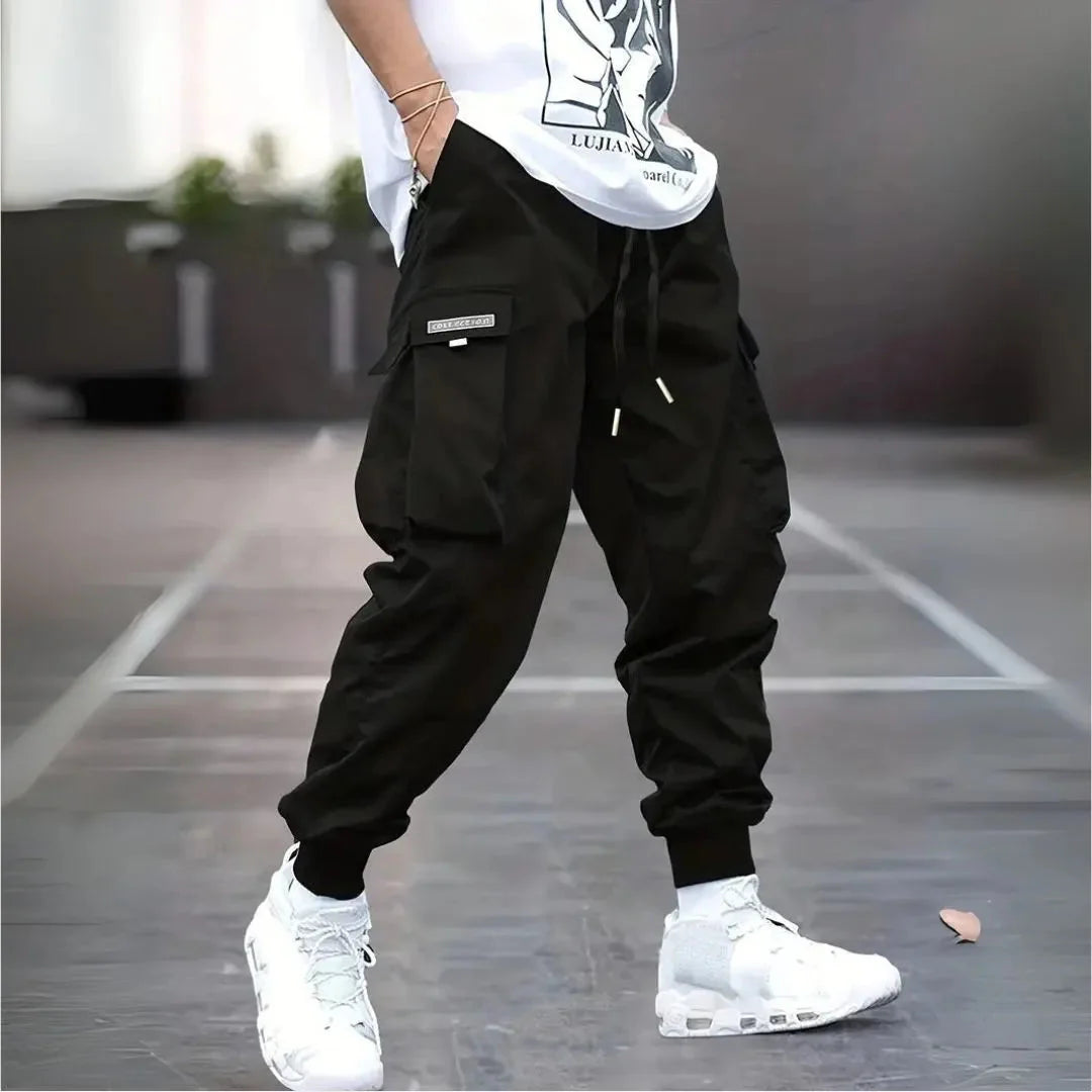 Men's olive cargo jogger pants relaxed fit with multi-pocket utility design and ribbed cuffs