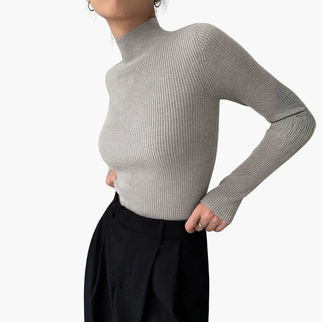 Women's ribbed knit pullover top with stand-up collar, long sleeve, structured minimalist silhouette