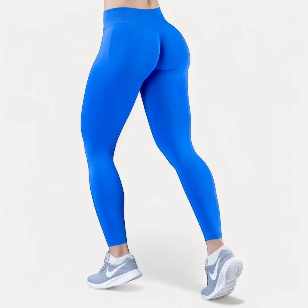 Women's black high-waist compression leggings with butt-lift scrunch detail and seamless sculpting fit