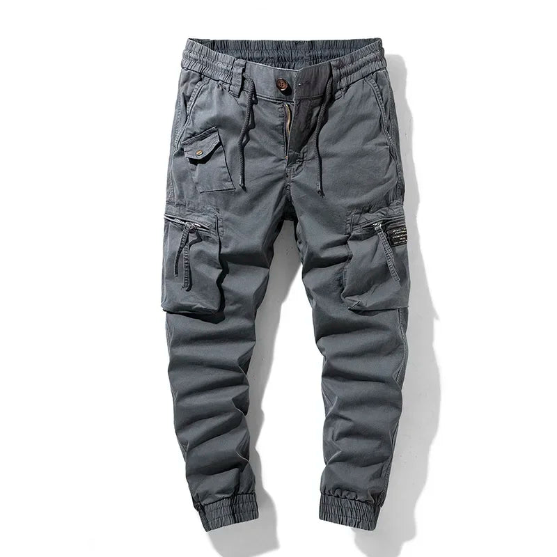 Black utility jogger pants tapered fit with tactical zip pockets and stretch waist for streetwear