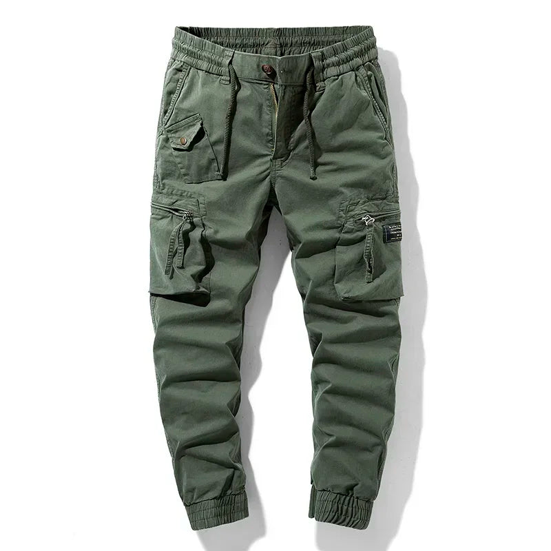 Dark utility jogger pants tapered fit with tactical zip pockets and stretch waist for streetwear
