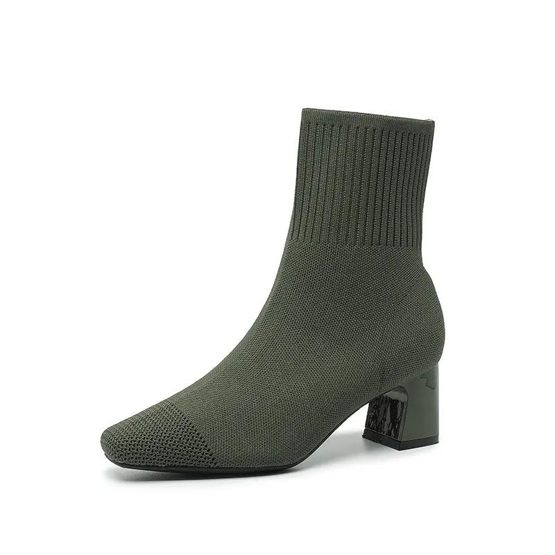 Women's stretchy knit sock boots mid heel, fitted ankle silhouette in neutral toned fabric