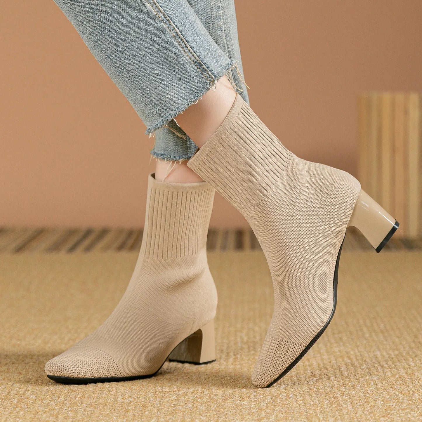 Women's stretchy knit sock boots mid heel ankle boots in neutral tones with seamless sock-like fit