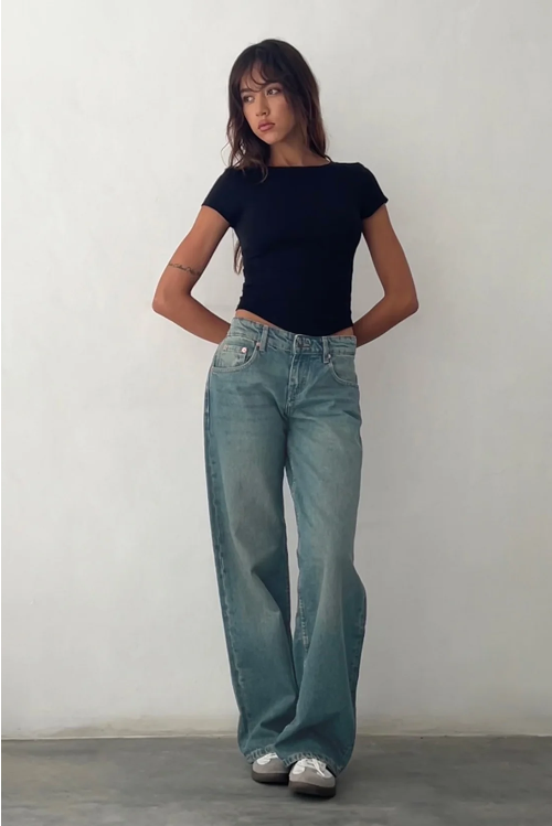 Women's low-rise stretch denim jeans in classic blue, flattering hip-accentuating cut for all-day comfort