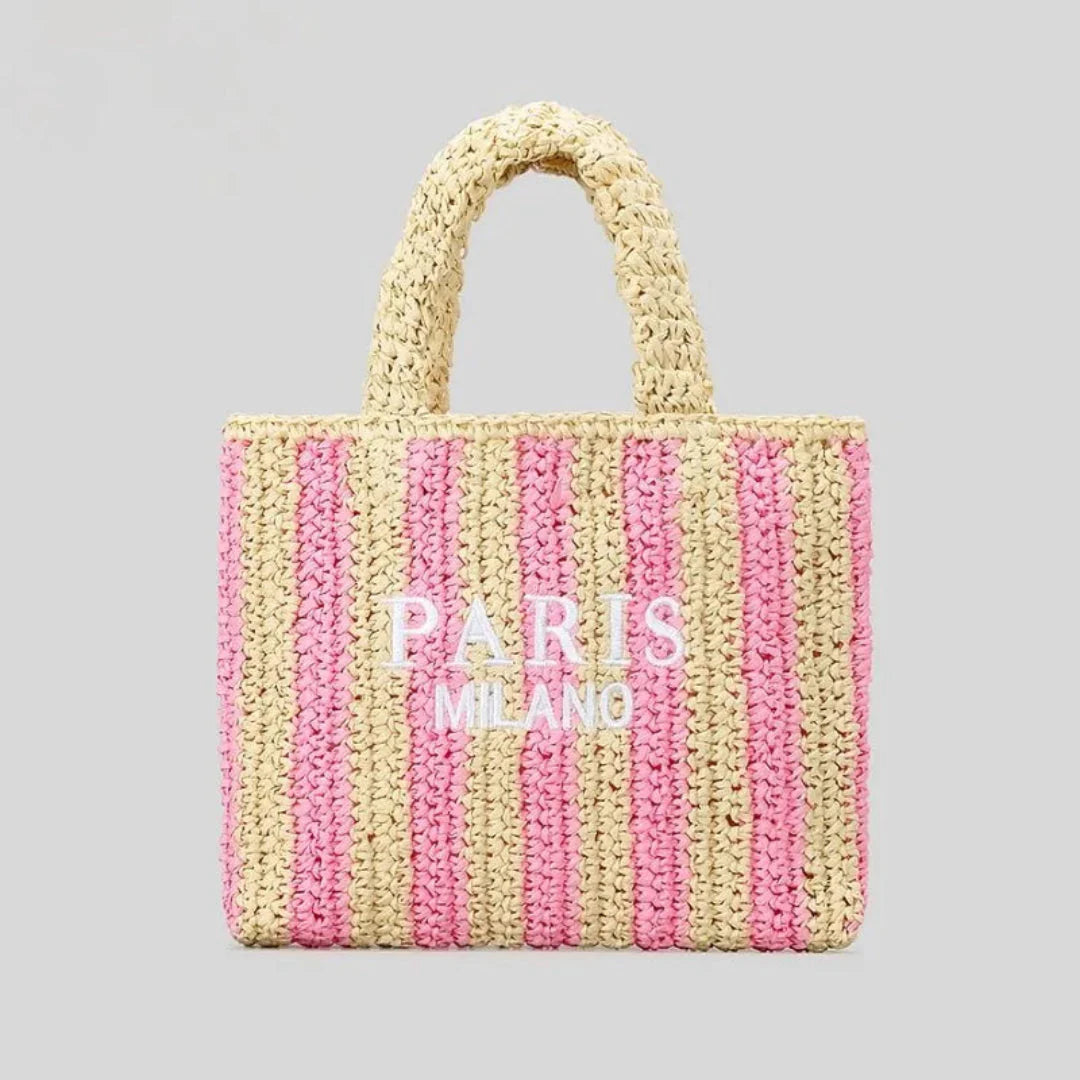 Handcrafted woven straw tote bag with bold vibrant stripes, lightweight beach market carry-all for women