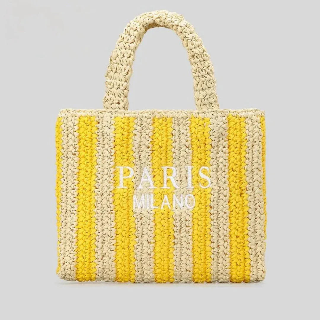 Handcrafted woven straw tote bag with bold vibrant stripes, lightweight beach and market carry-all for women