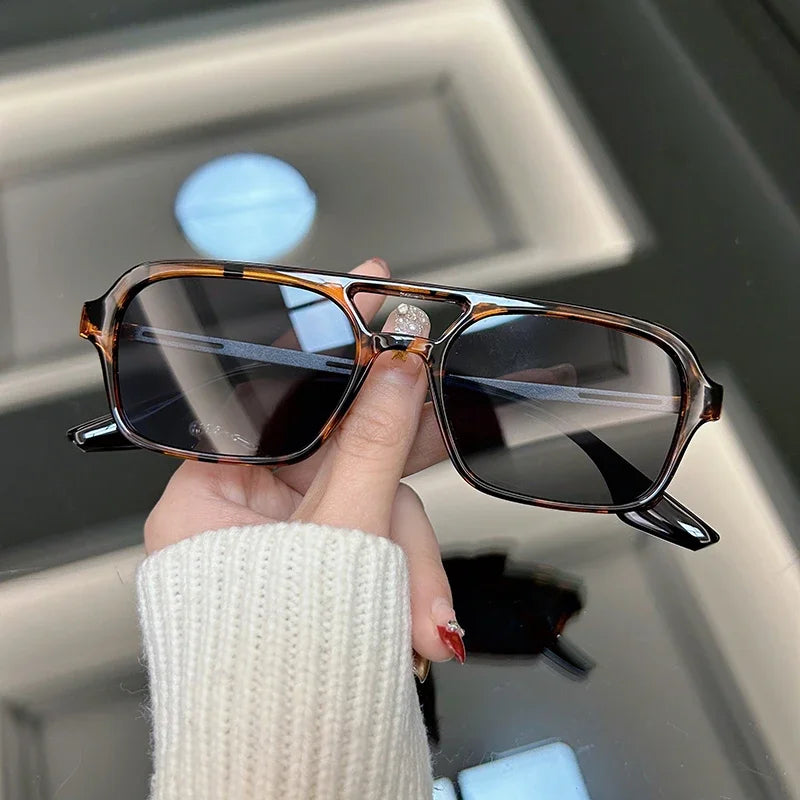 Bold rectangular acetate sunglasses retro-modern angular silhouette everyday edge unisex eyewear