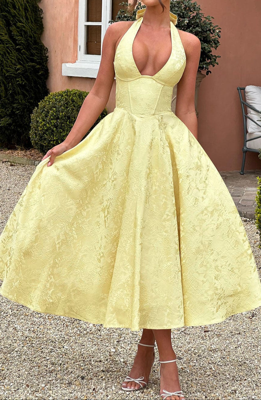 Yellow jacquard midi dress plunging halter neckline structured silhouette wedding guest summer formal