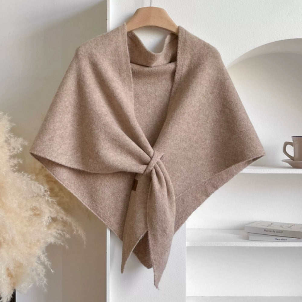 Women's wool poncho cape shawl in neutral tones with knotted front detail and fluid draped fit