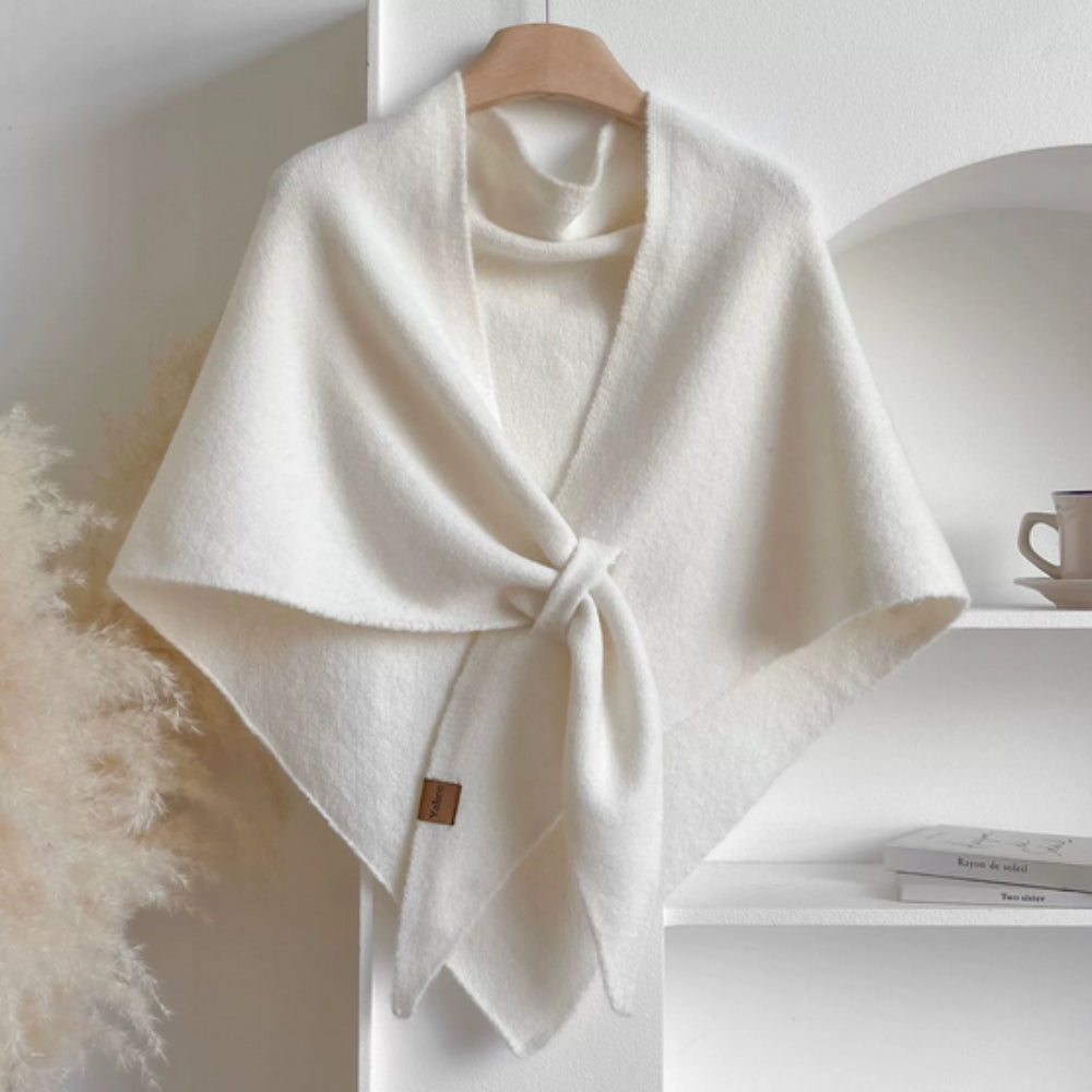 Women's wool poncho cape shawl in neutral tones with knotted front drape for cozy elegant style