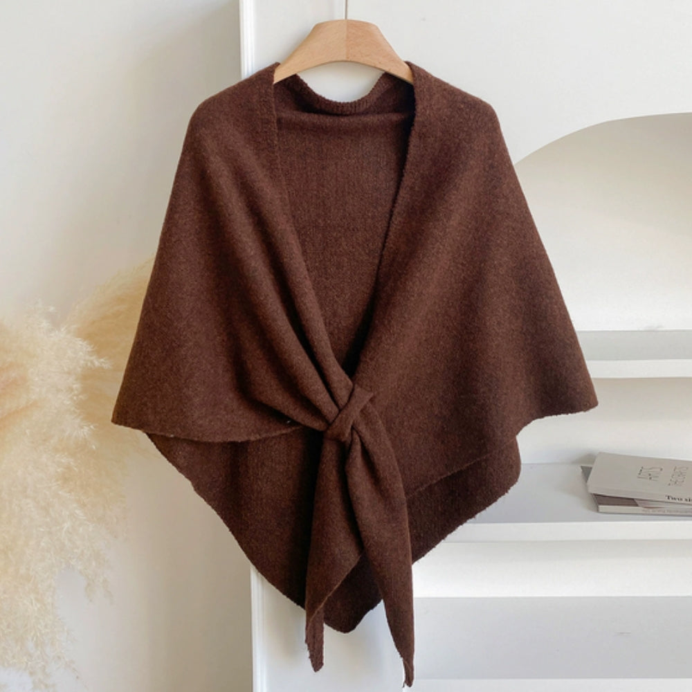Women's wool poncho cape shawl in neutral tones with knotted front detail and fluid draped silhouette