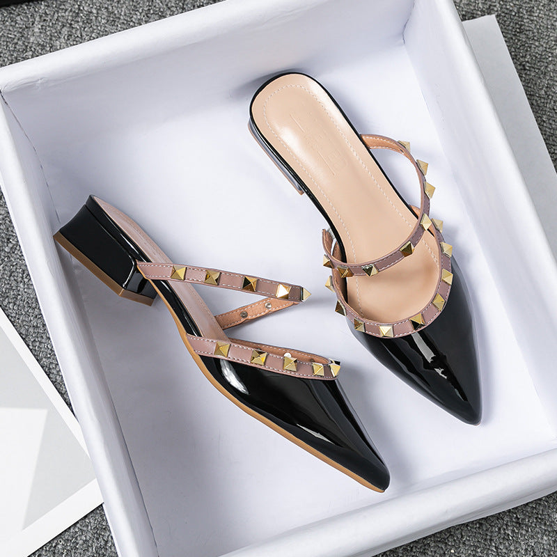 Glossy patent pointed-toe mules with dual studded straps, edgy rock-inspired style for women