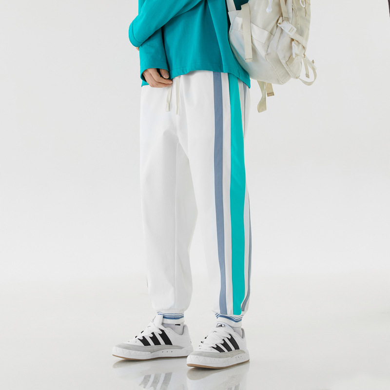 Unisex retro joggers dual-tone side stripes elastic waist 90s streetwear athletic fit vintage style