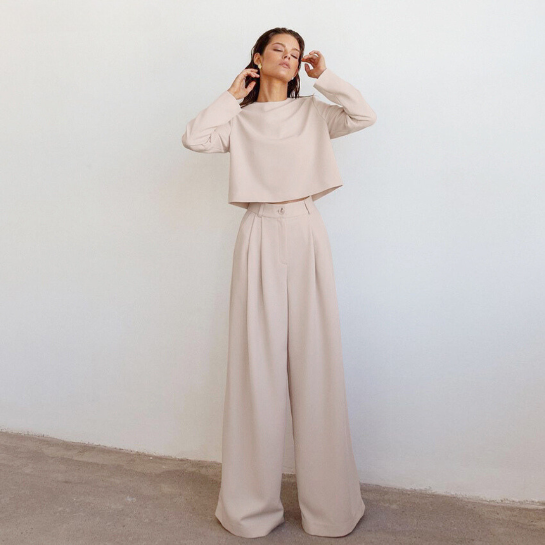 Elegant women's two-piece set wide-leg trousers coordinated blouse formal polished silhouette