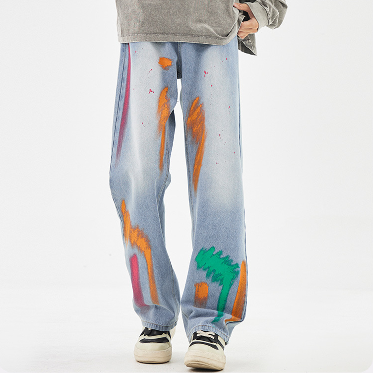 Tyga spray-painted denim jeans relaxed straight fit vibrant graffiti streetwear art streaks