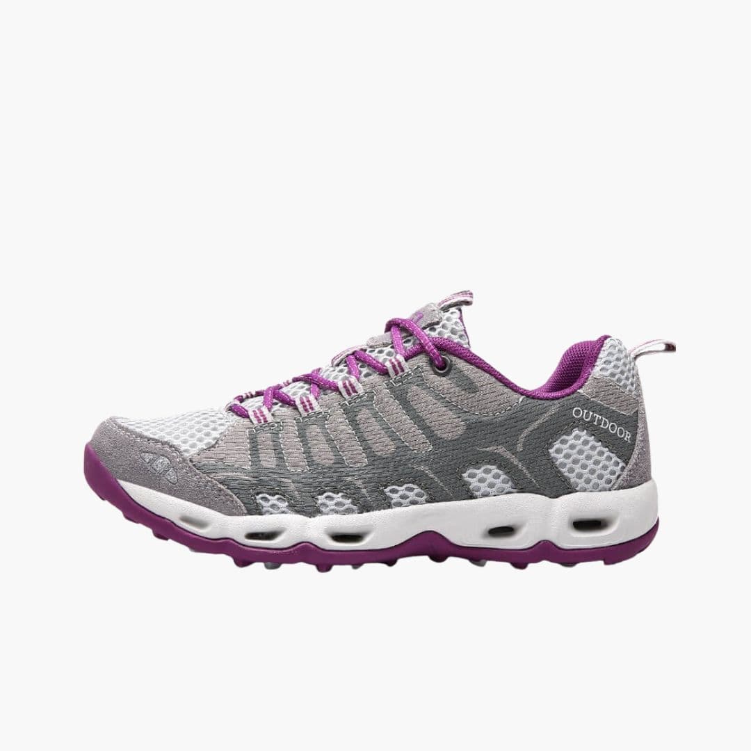 Unisex lace-up hiking shoes with paneled upper, textured outsole, and all-terrain grip comfort
