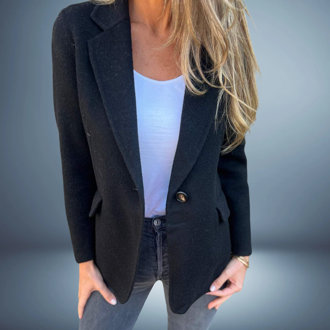 Women's longline tailored blazer with button closure, elegant office wear with defined silhouette