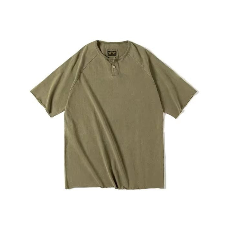 Heavyweight washed henley shirt loose fit distressed cotton workwear style in faded neutral tones