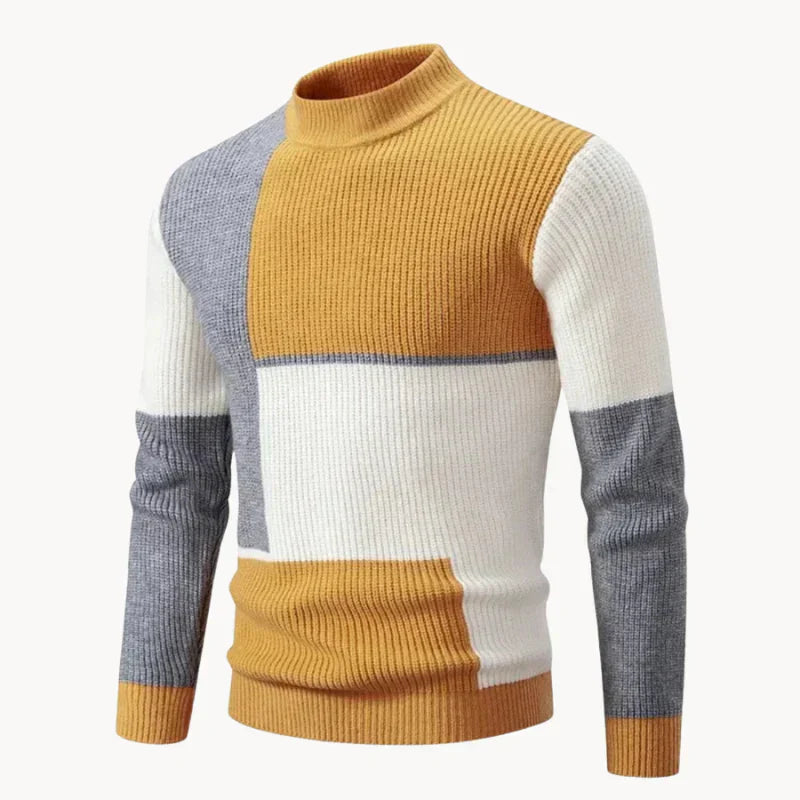 Men's navy and cream knit jumper with bold graphic block pattern, relaxed fit for casual wear