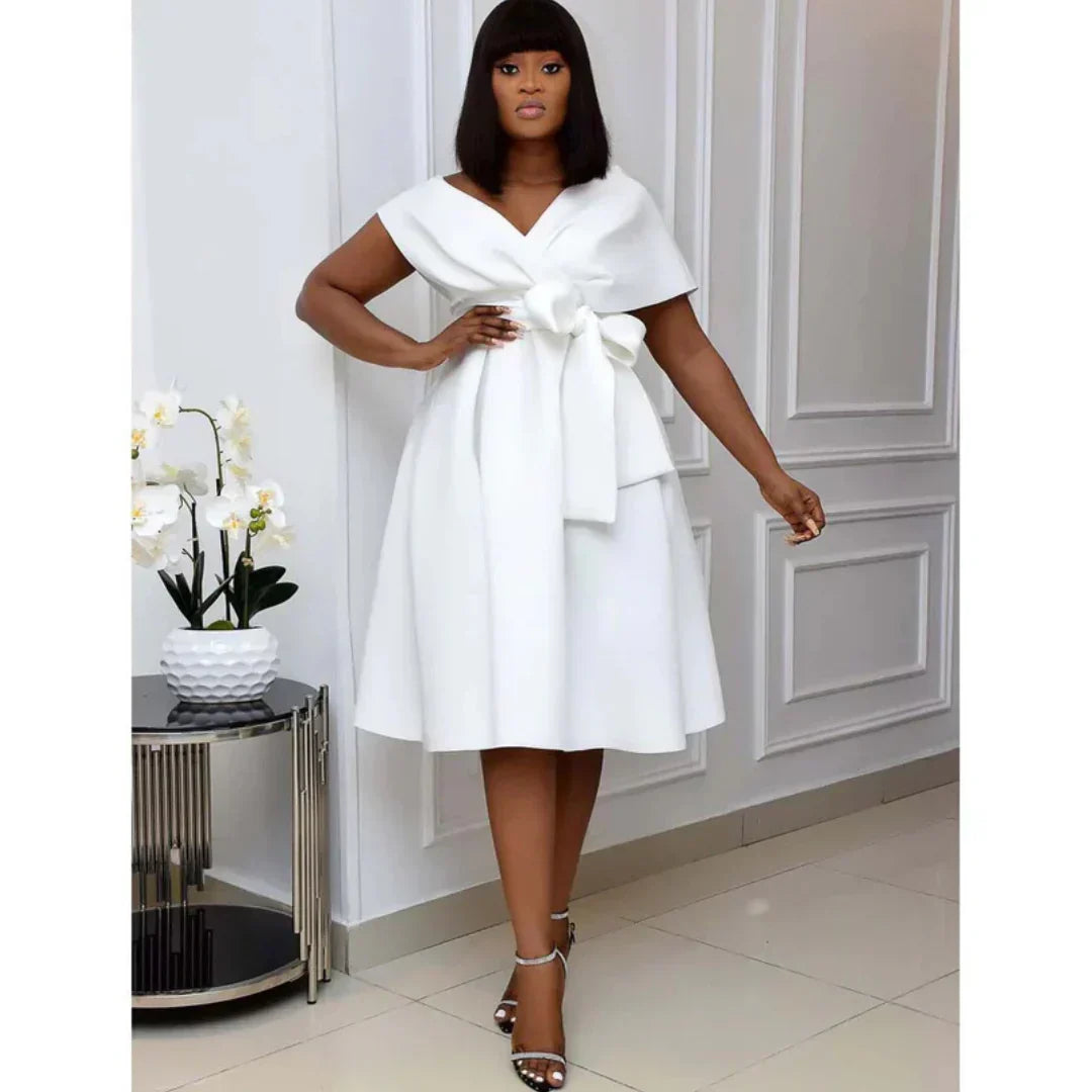 Women's elegant mini A-line dress with short sleeves, flattering silhouette for versatile day-to-night wear