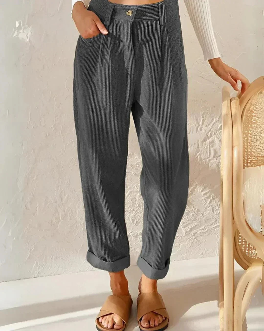 Women's brown corduroy high-waist ankle-length trousers with tailored elegant workwear fit