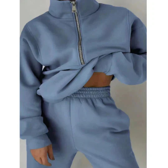 Women's gray zipper tracksuit soft breathable fabric slim fit design ideal for workouts and active lifestyle