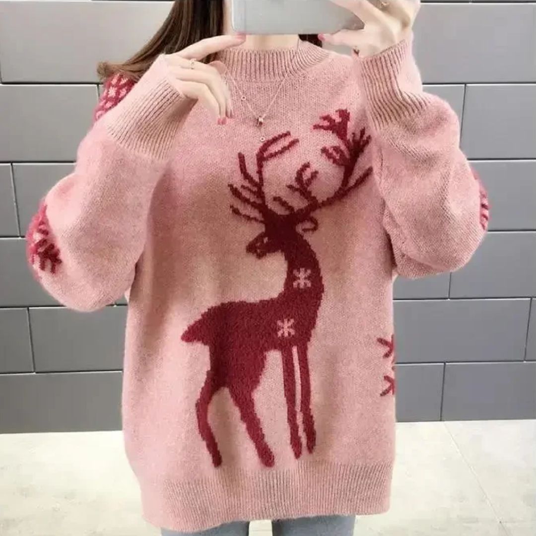 Women's cozy white winter sweater with bold reindeer pattern, relaxed fit for festive everyday style
