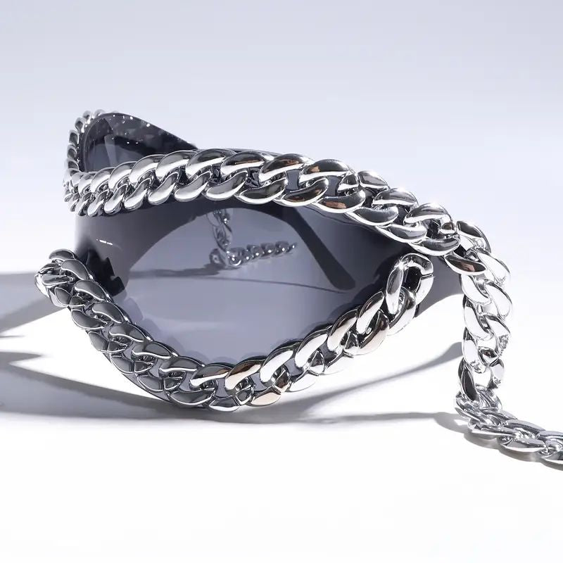 CØRVUS wraparound sunglasses with heavyweight polished chain accents for bold street style